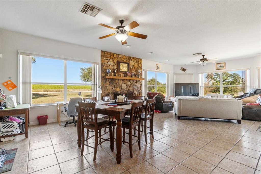 2307 Cass Road Lake Alfred, FL 33850 - Photo 40 of 67 a view of a dining room with furniture window and outside view