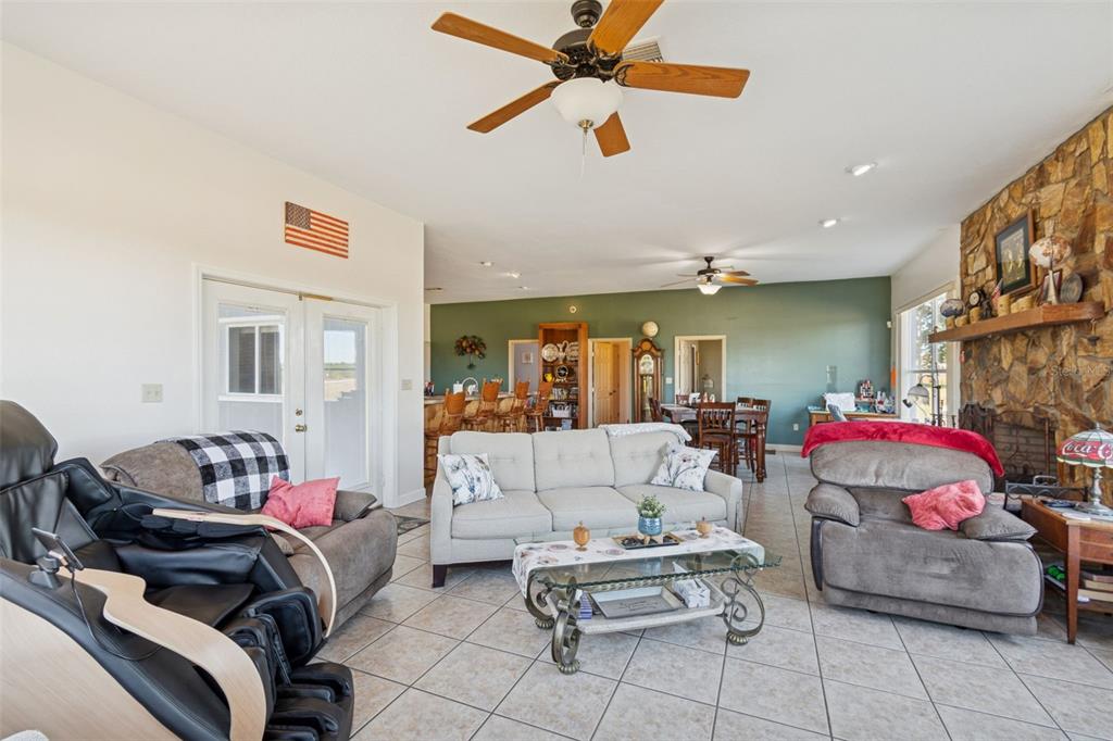 2307 Cass Road Lake Alfred, FL 33850 - Photo 46 of 67 a living room with furniture and a baby crib