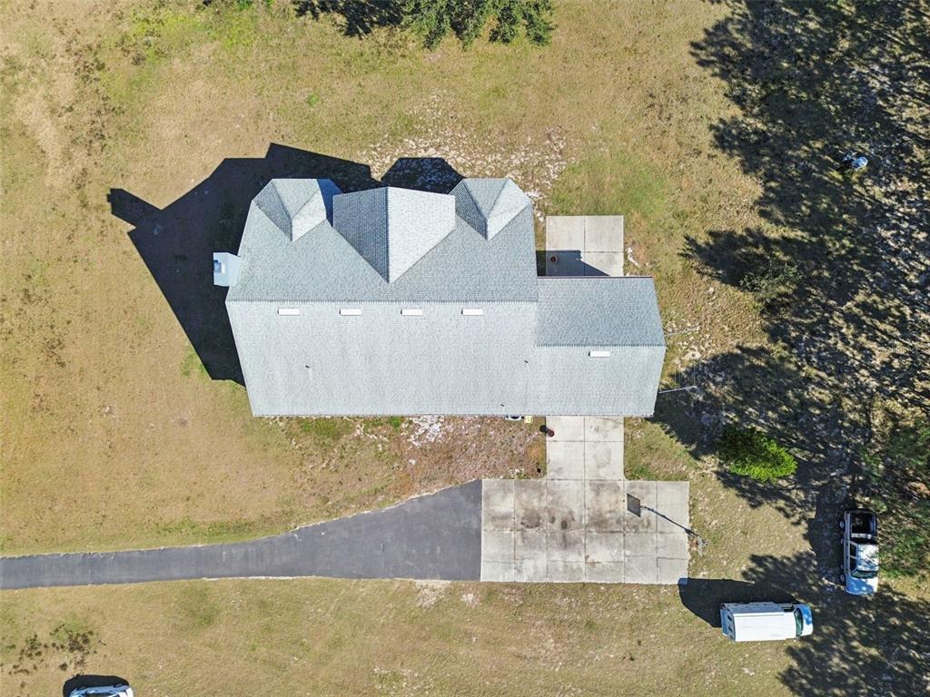 2307 Cass Road Lake Alfred, FL 33850 - Photo 56 of 67 an aerial view of residential house with outdoor space