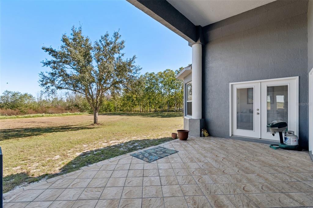2307 Cass Road Lake Alfred, FL 33850 - Photo 6 of 67 a view of a house with backyard and trees