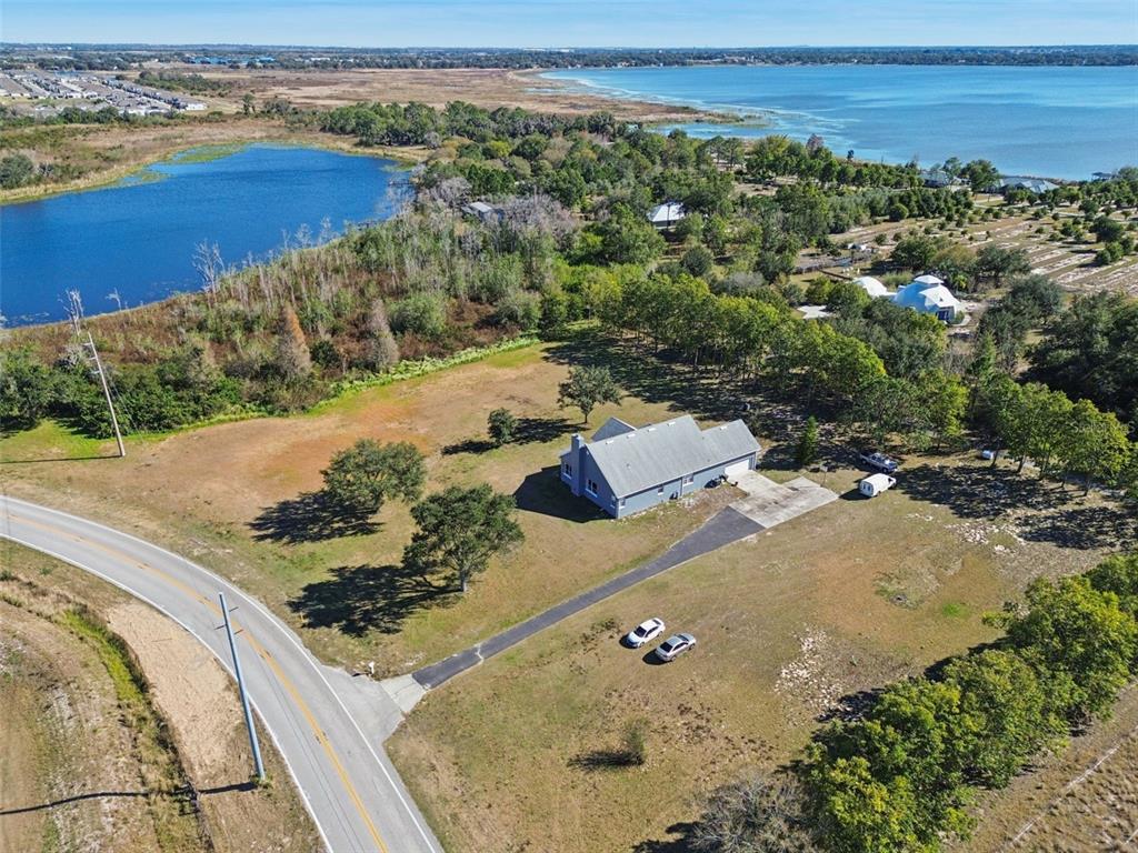 2307 Cass Road Lake Alfred, FL 33850 - Photo 61 of 67 an aerial view of a house with a yard