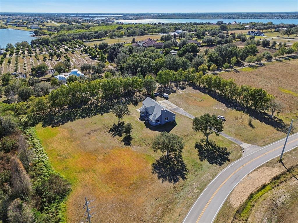 2307 Cass Road Lake Alfred, FL 33850 - Photo 63 of 67 an aerial view of residential house with outdoor space