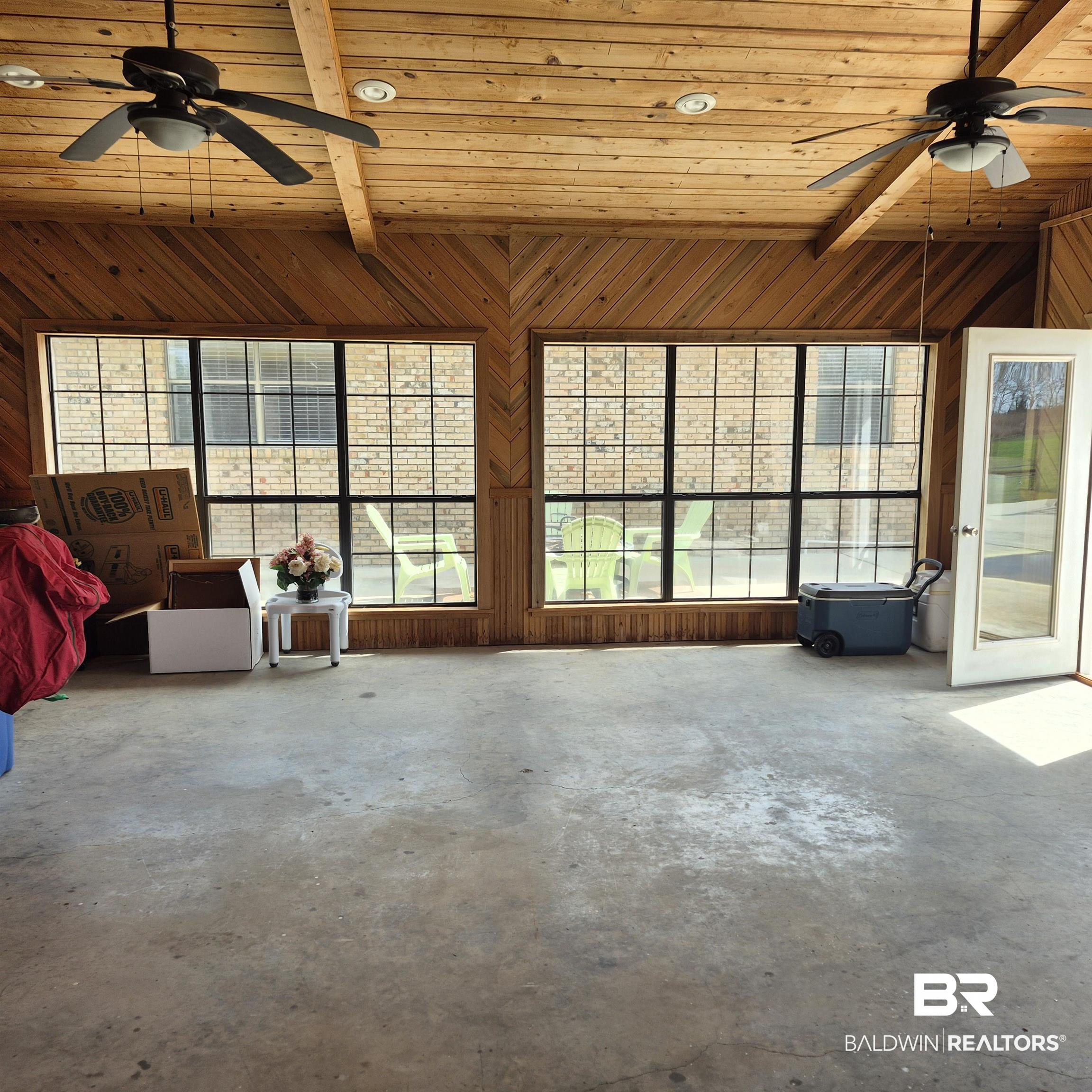26635 Highway 41 Range, AL 36473 - Photo 46 of 74 Unfurnished sunroom featuring lofted ceiling with beams