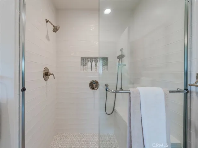 a room with furniture and a large window