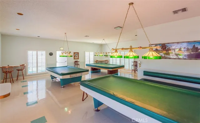 a view of a lake with a house in background