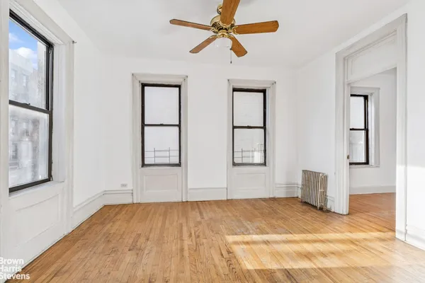 a view of empty room with windows