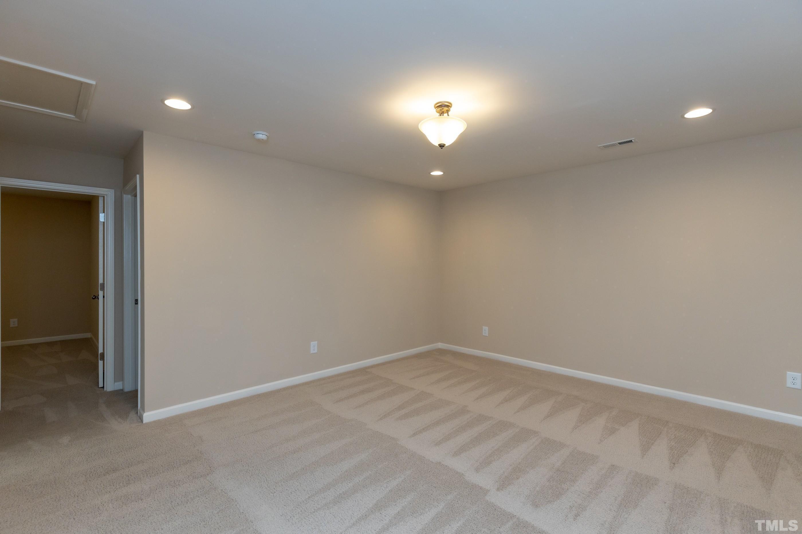 566 Chessie Station Apex, NC 27502 - Photo 14 of 29 a view of an empty room with a window