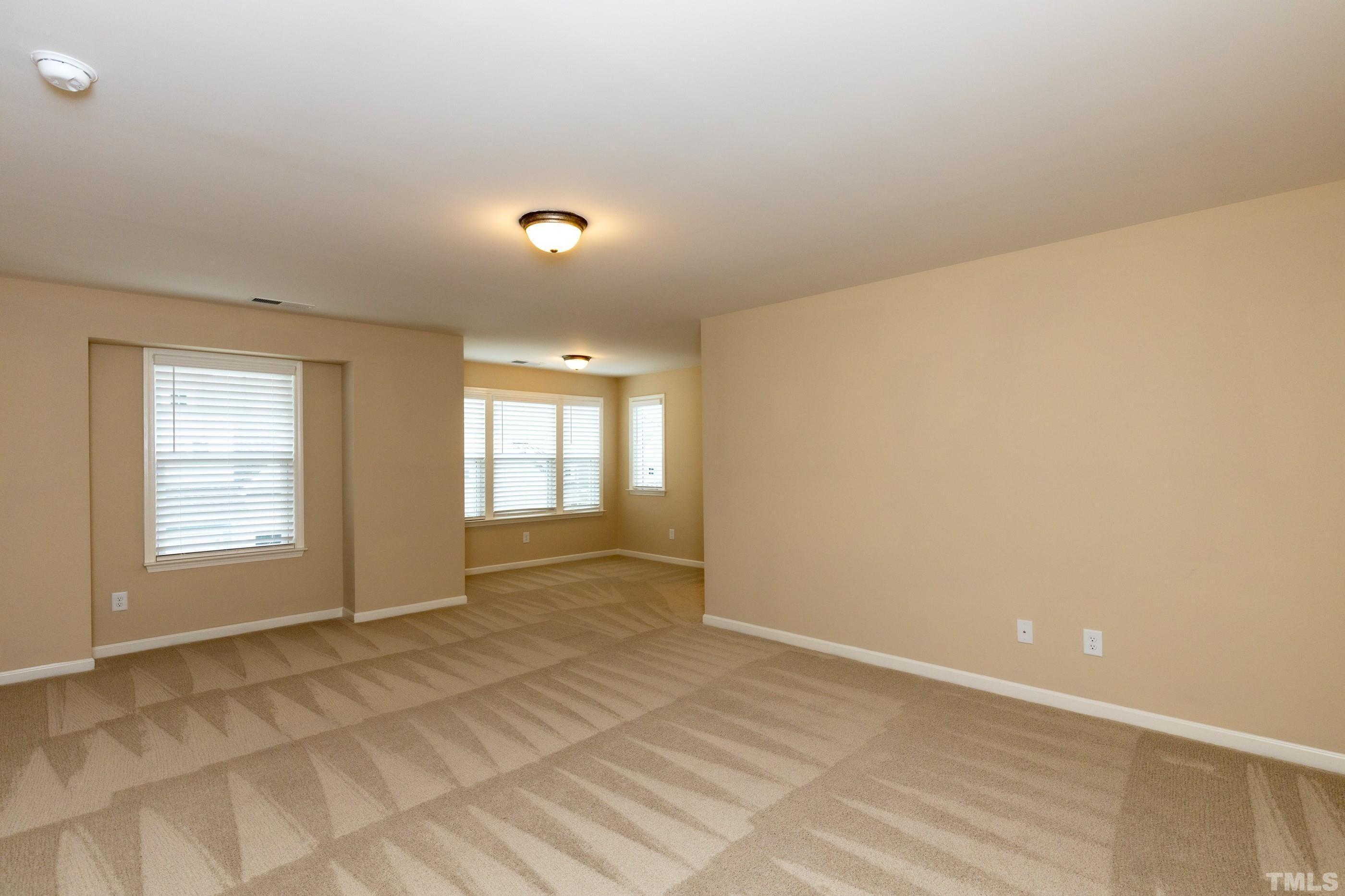 566 Chessie Station Apex, NC 27502 - Photo 16 of 29 a view of an empty room and window