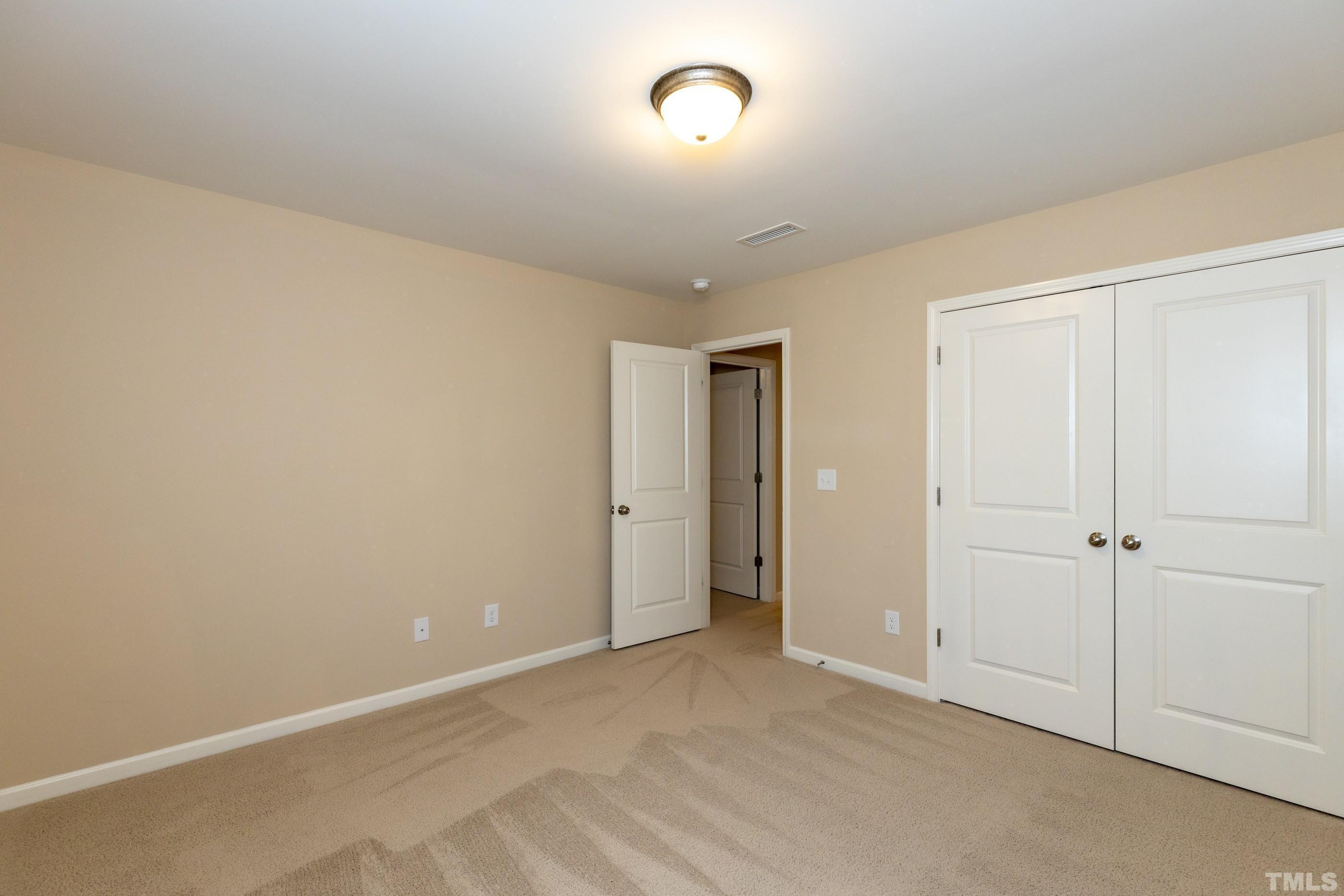 566 Chessie Station Apex, NC 27502 - Photo 22 of 29 a view of an empty room