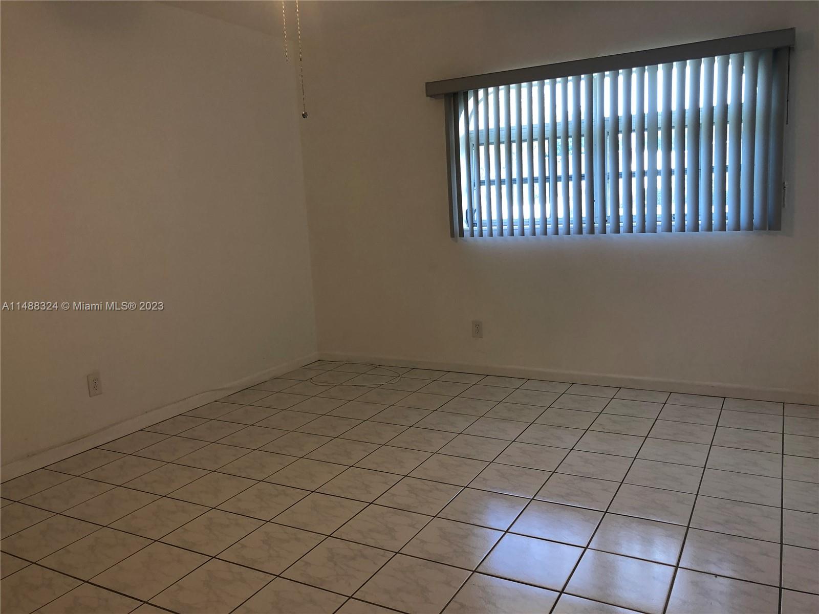 West Perrine Miami, FL 33157 - Photo 12 of 15 a view of an empty room and window