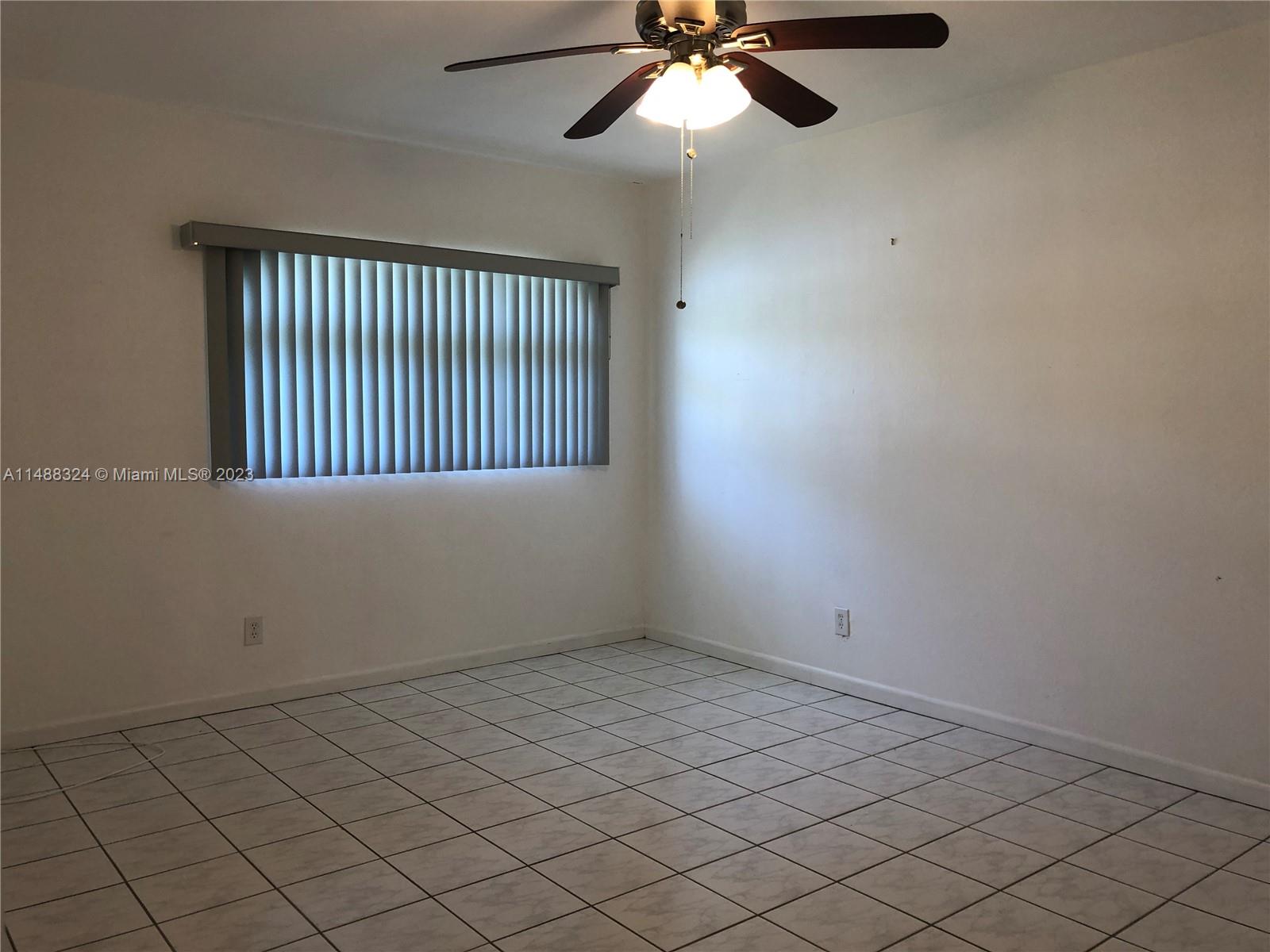 West Perrine Miami, FL 33157 - Photo 13 of 15 an empty room with a window