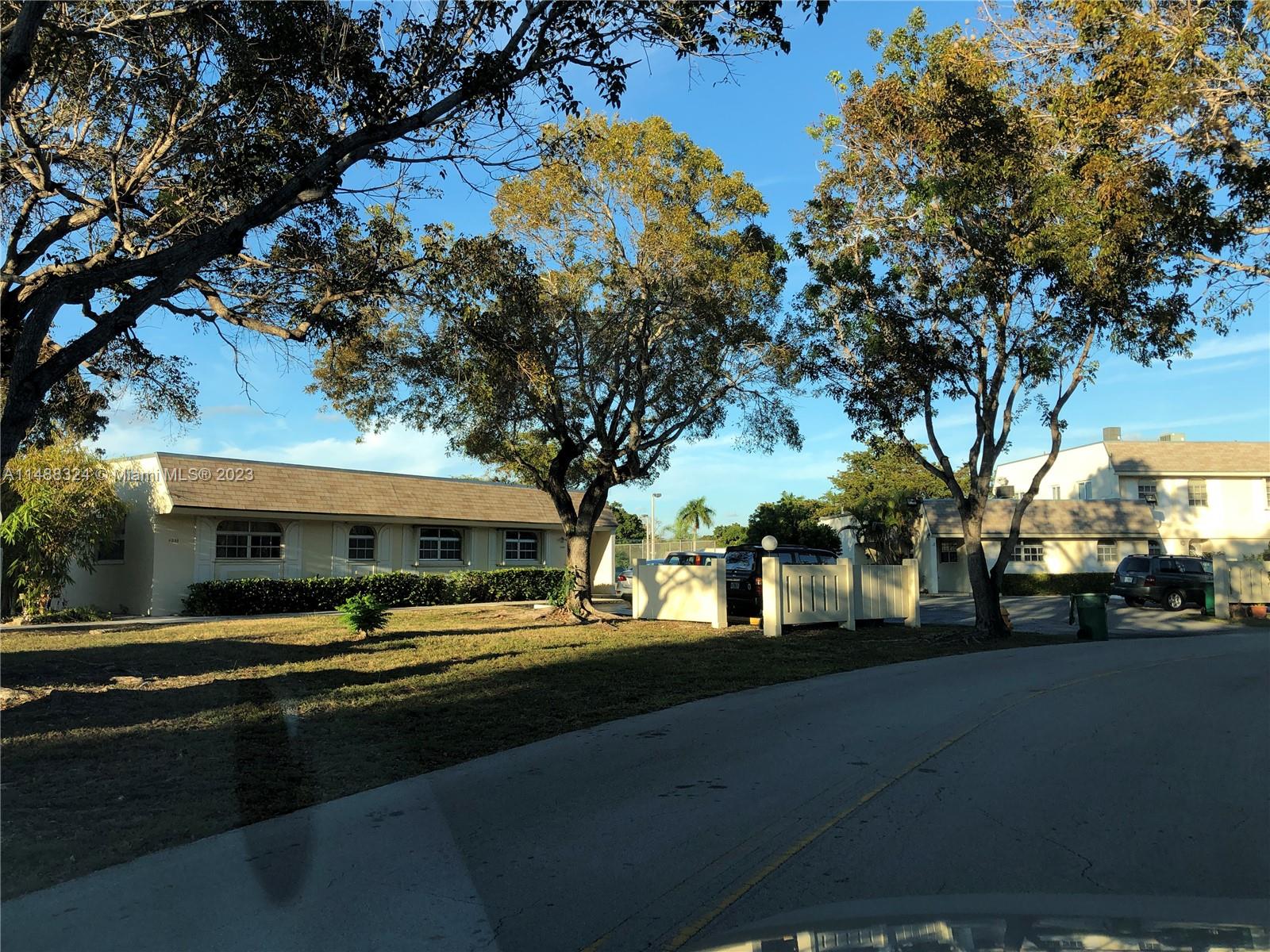 West Perrine Miami, FL 33157 - Photo 2 of 15 a front view of a building with street view