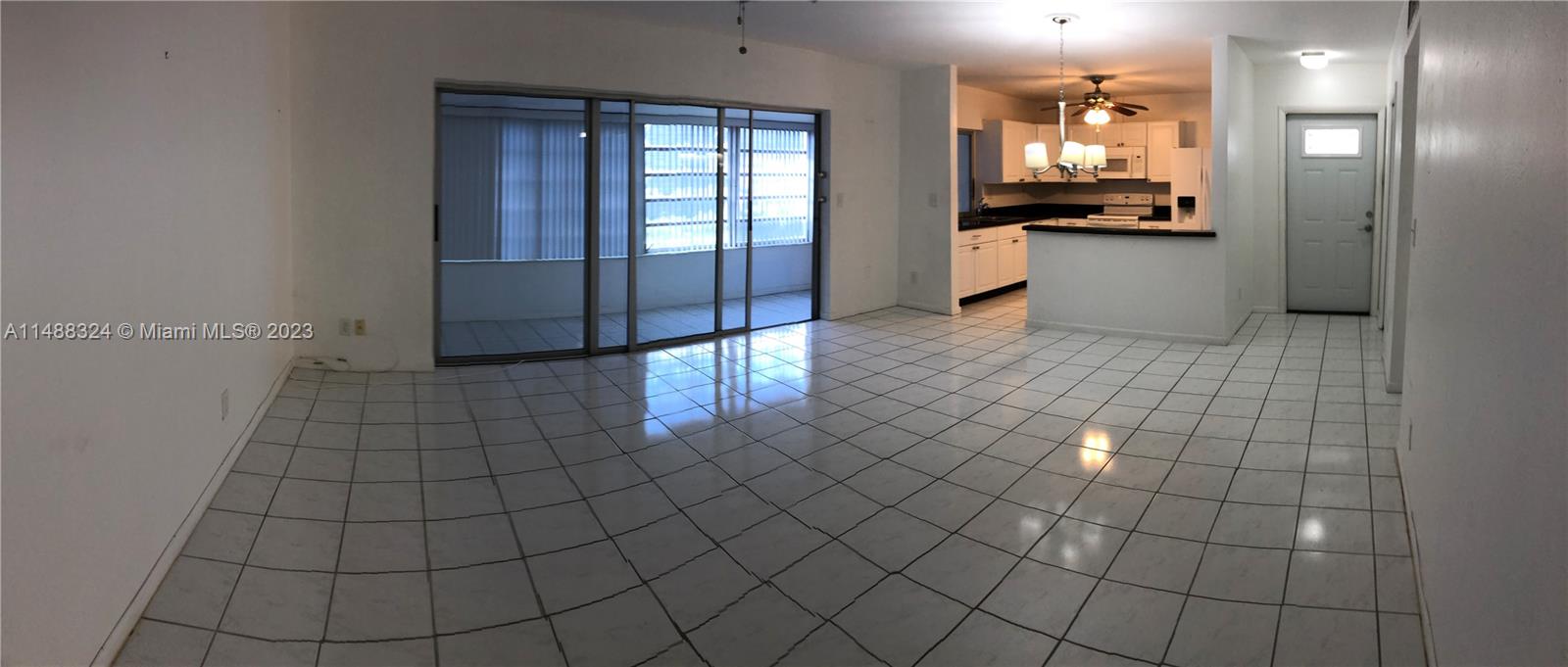 West Perrine Miami, FL 33157 - Photo 7 of 15 a view of a living room with a wooden floor