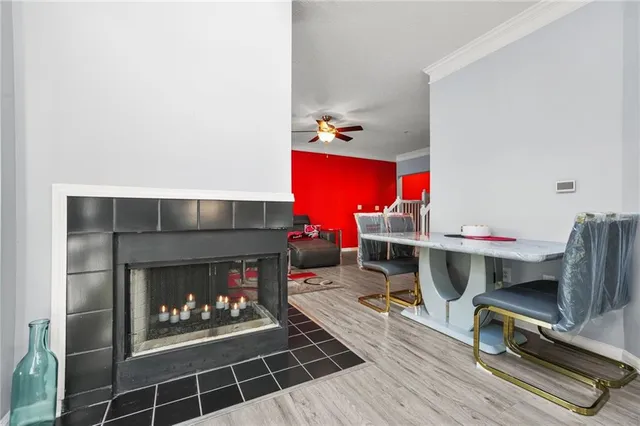 a kitchen with stainless steel appliances a white cabinets and a stove top oven