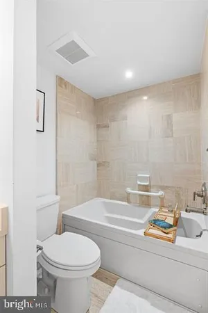 a bathroom with a sink and a toilet