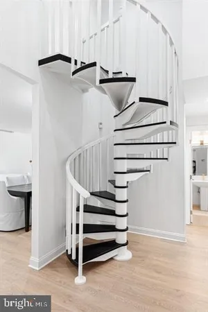 a view of entryway and kitchen