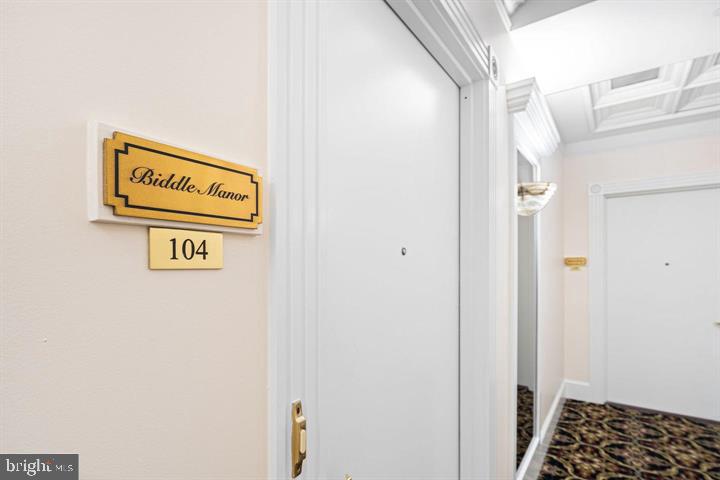 211 South 4th Street, Unit 104 Philadelphia, PA 19106 - Photo 10 of 45 a view of a hallway with wooden door