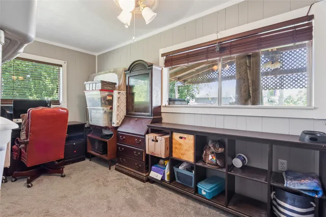 a room with furniture and a window