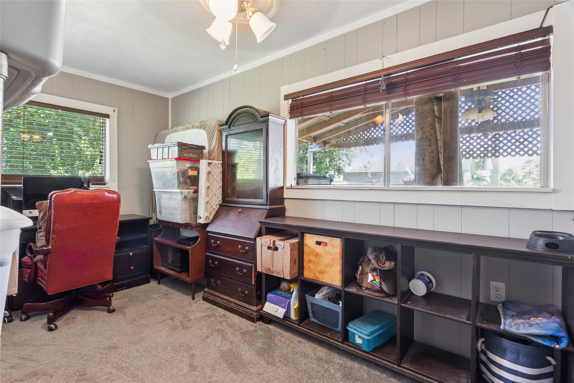 4820 Palmetto Street Bacliff, TX 77518 - Photo 16 of 22 a room with furniture and a window