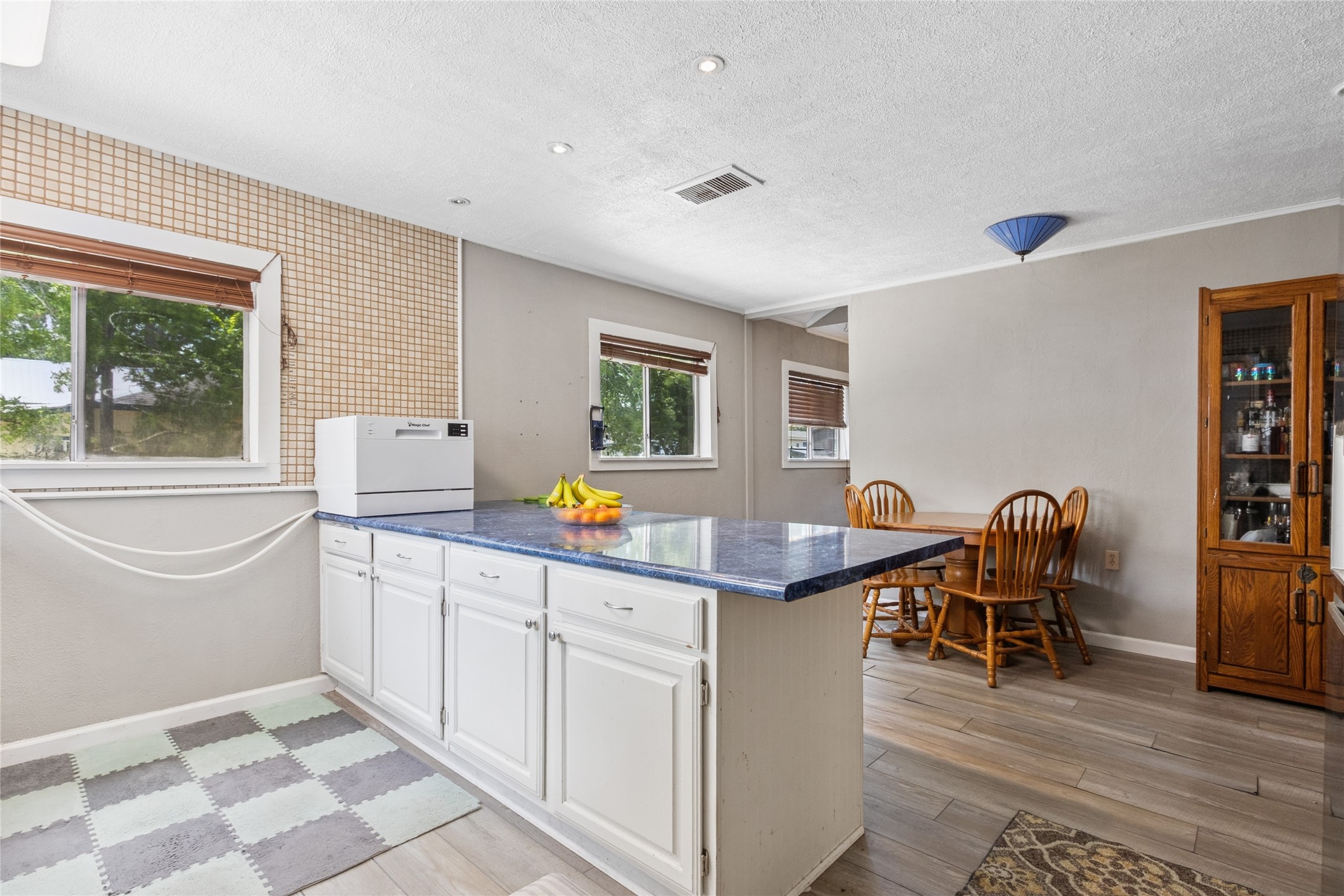 4820 Palmetto Street Bacliff, TX 77518 - Photo 10 of 22 a view of a kitchen and dining room