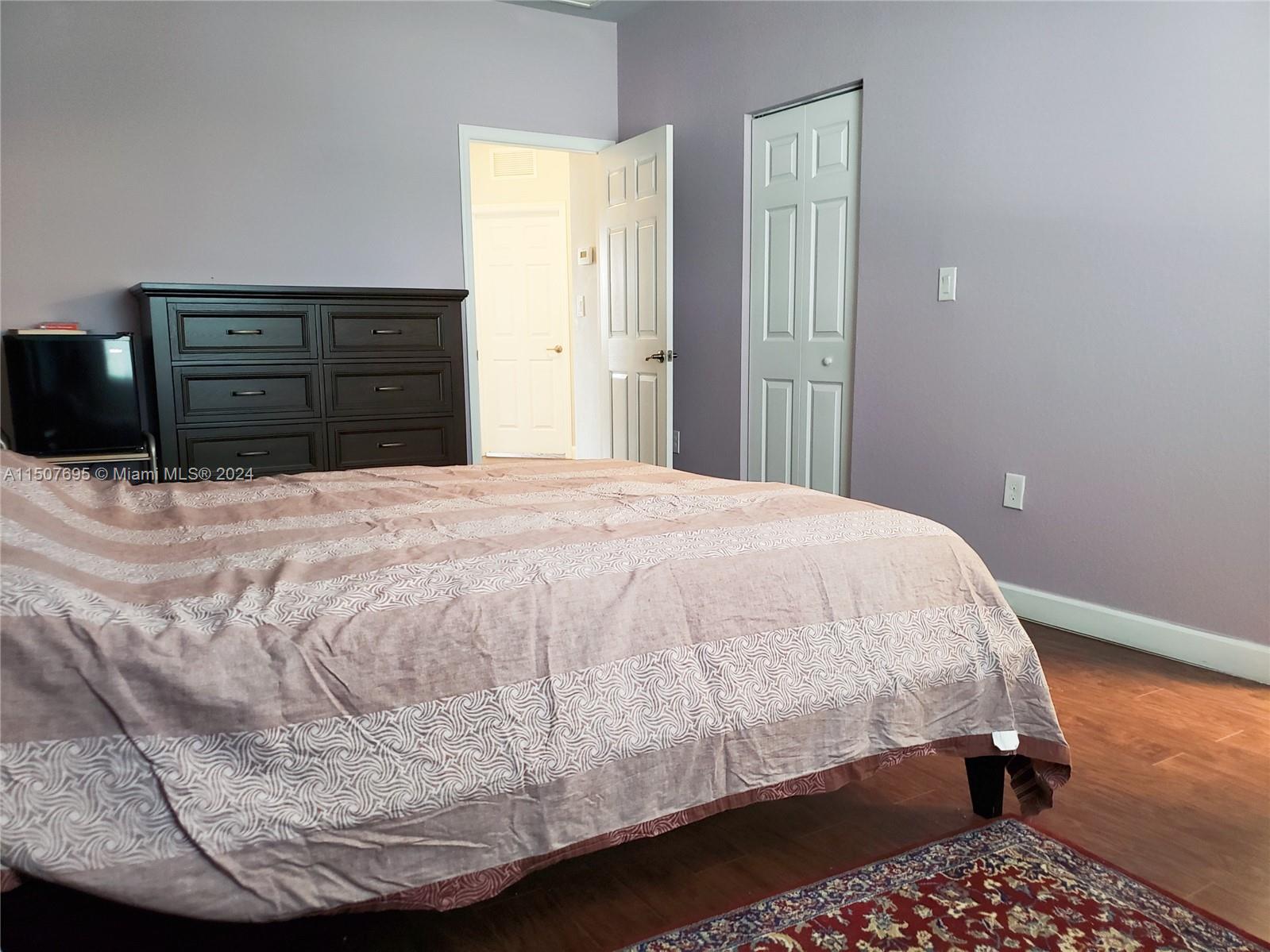 11343 Southwest 232nd Terrace Homestead, FL 33032 - Photo 16 of 35 a bedroom with a bed and closet