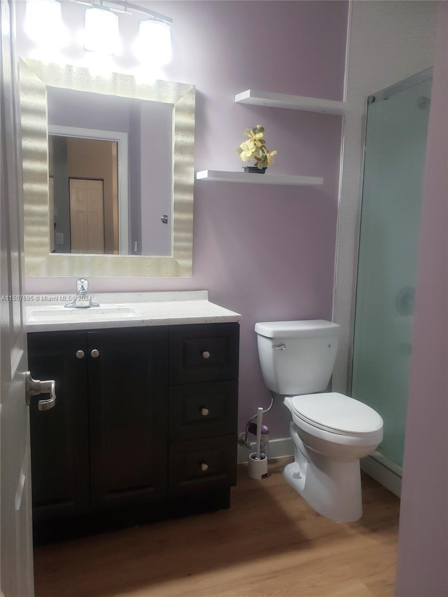 11343 Southwest 232nd Terrace Homestead, FL 33032 - Photo 25 of 35 a bathroom with a sink and a toilet