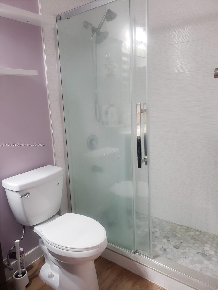 11343 Southwest 232nd Terrace Homestead, FL 33032 - Photo 26 of 35 a bathroom with a toilet and a shower