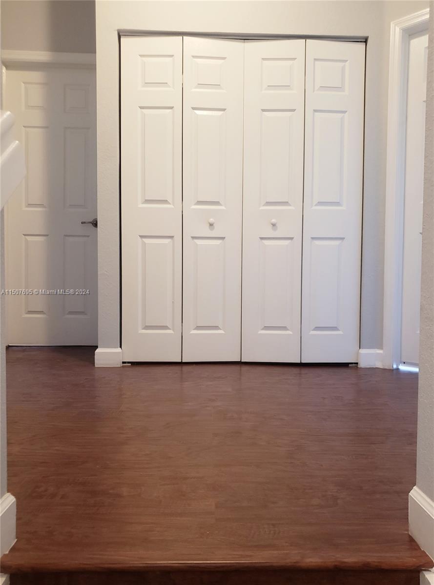 11343 Southwest 232nd Terrace Homestead, FL 33032 - Photo 27 of 35 a view of a room with wooden floor