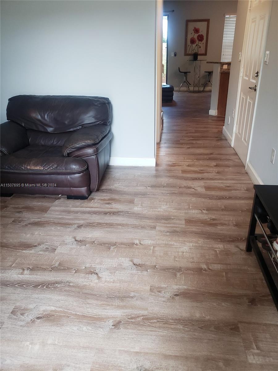 11343 Southwest 232nd Terrace Homestead, FL 33032 - Photo 3 of 35 a living room with furniture and a couch