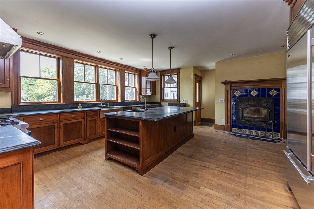 29 Gorham Street Chelmsford, MA 01824 - Photo 15 of 42 a kitchen with a stove and a sink