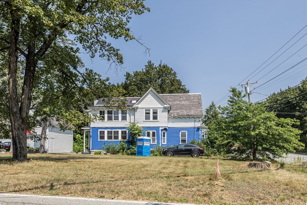 29 Gorham Street Chelmsford, MA 01824 - Photo 41 of 42 front view of a house with a yard