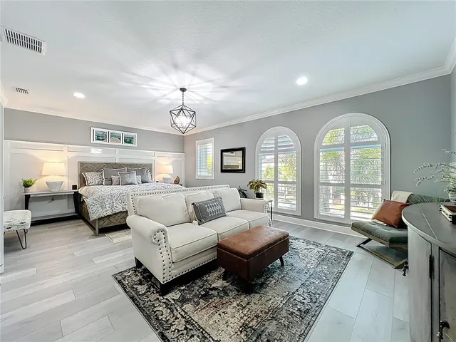 a bathroom with double sink and a mirror