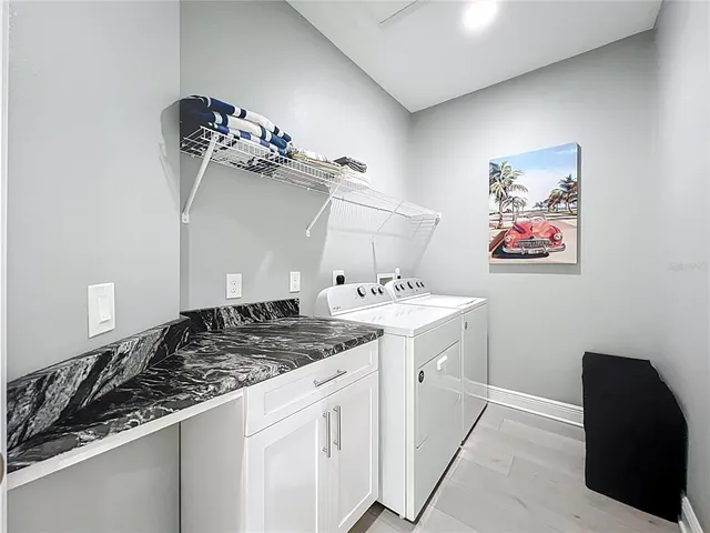 an outdoor space with furniture and garden