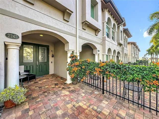 a view of hallway with furniture and a window