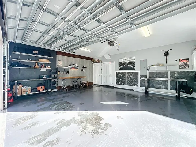 an aerial view of a house with garden space pool patio and outdoor seating