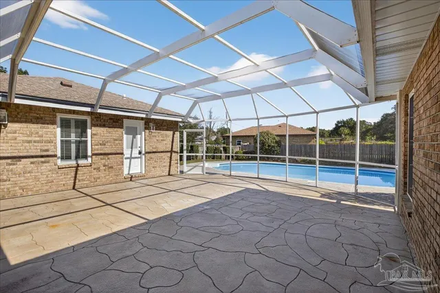 a view of a swimming pool and outdoor space