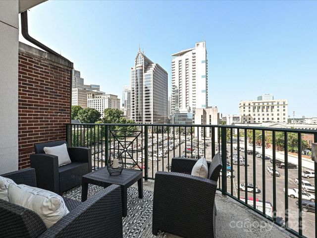 a view of a balcony with a couch