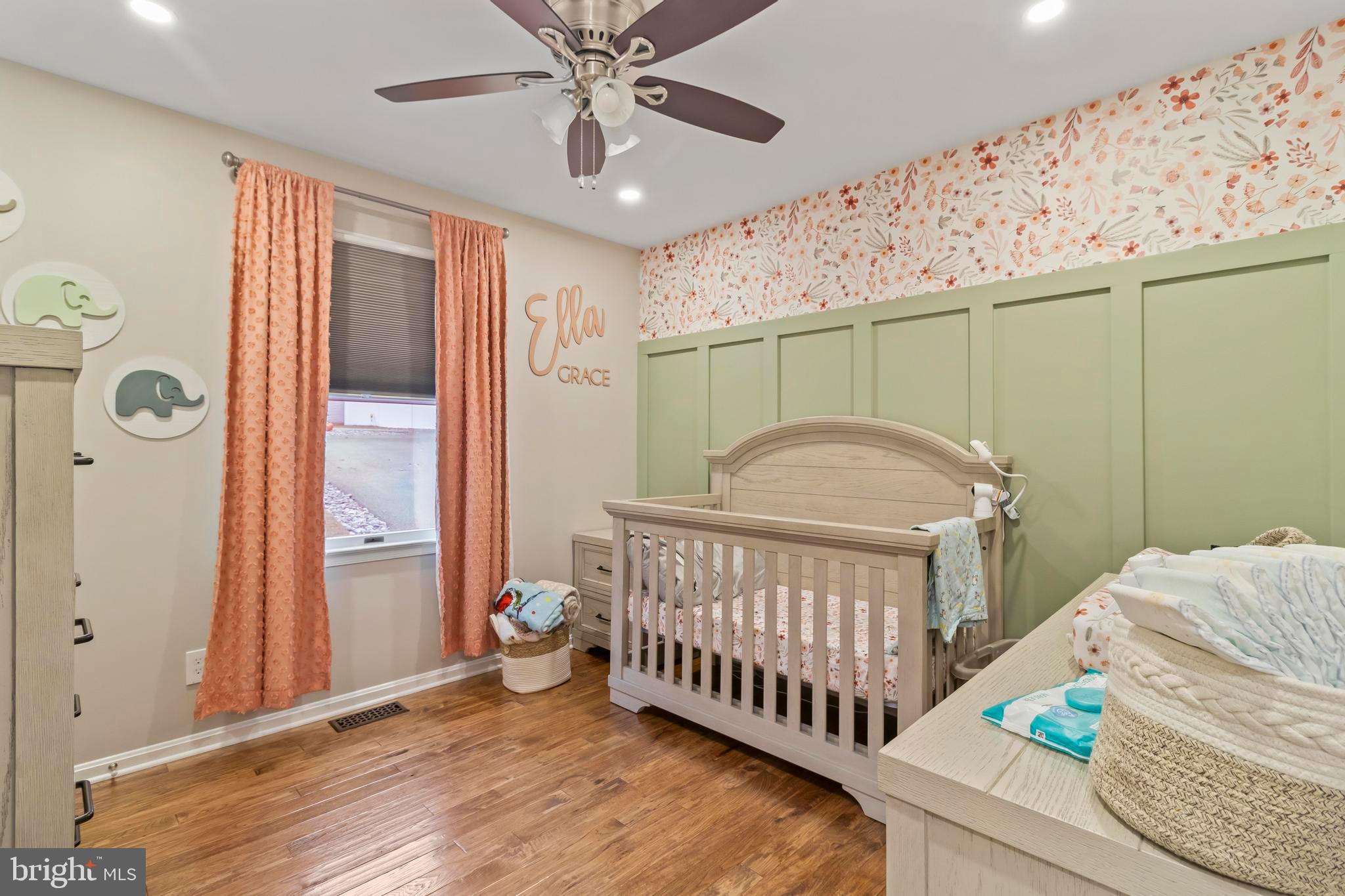 44350 Clarkes Landing Road Hollywood, MD 20636 - Photo 11 of 39 a bedroom with a bed and a window