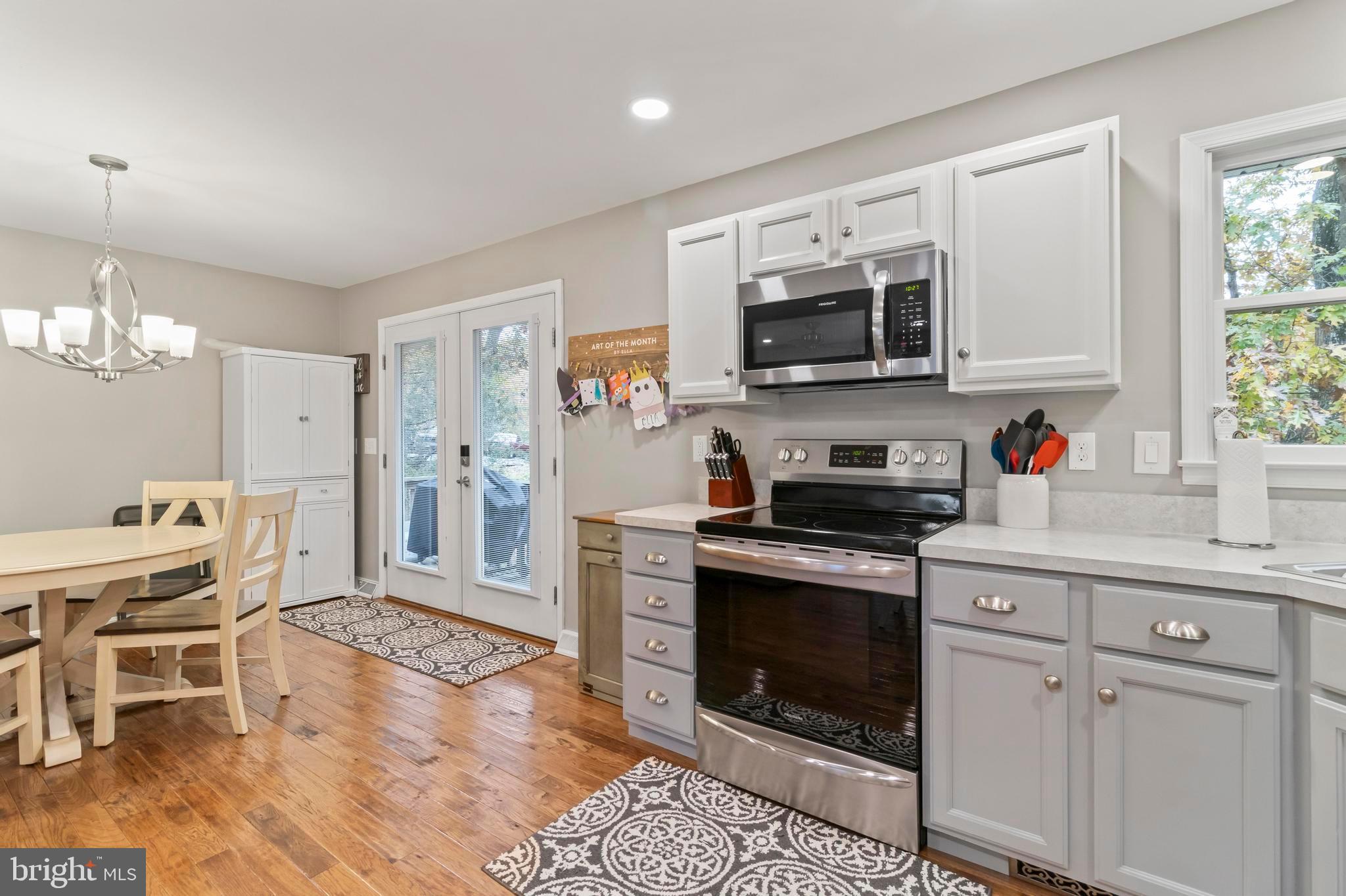 44350 Clarkes Landing Road Hollywood, MD 20636 - Photo 21 of 39 a kitchen with stainless steel appliances granite countertop a stove and a sink