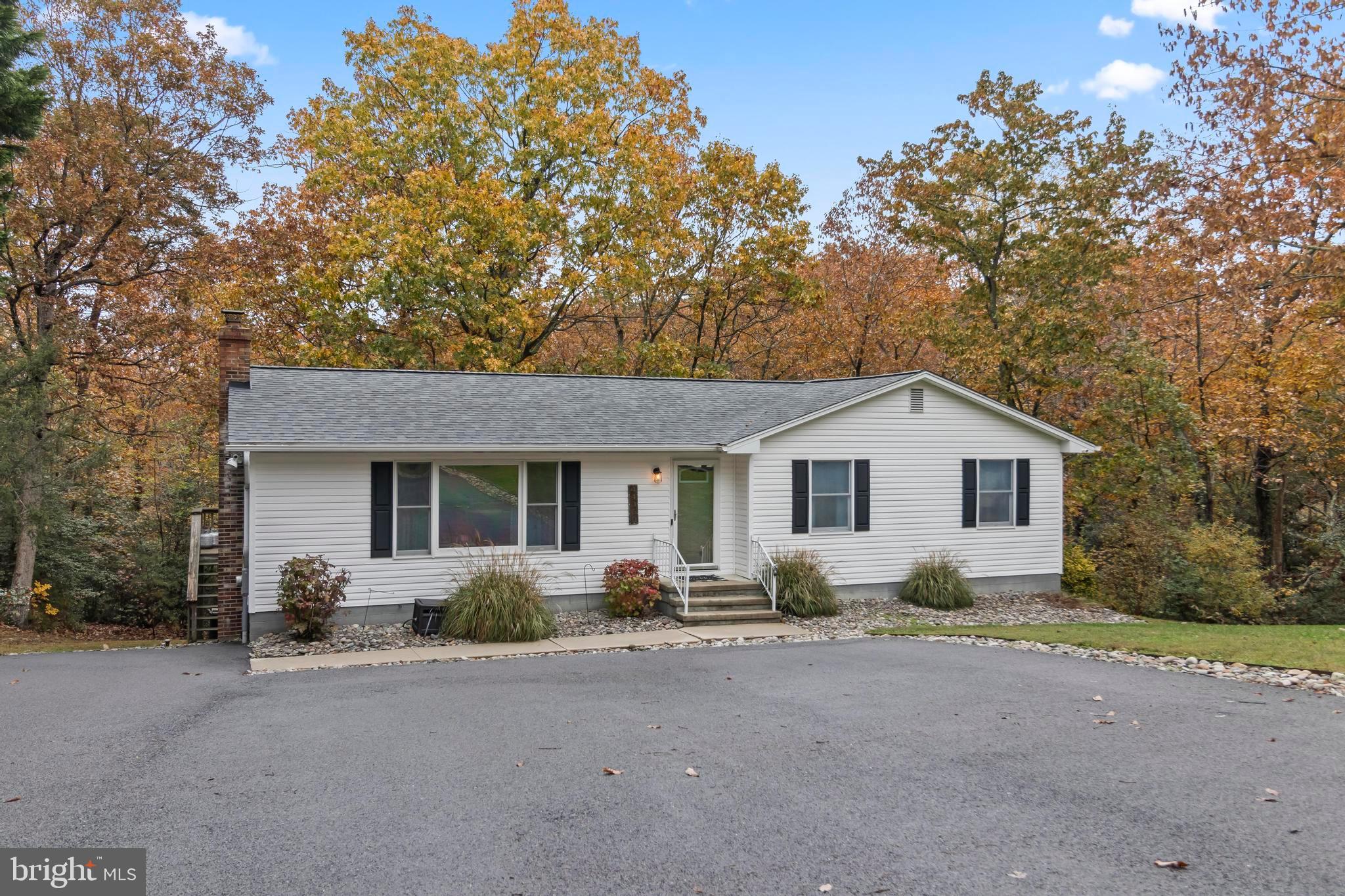44350 Clarkes Landing Road Hollywood, MD 20636 - Photo 29 of 39 front view of house with a yard