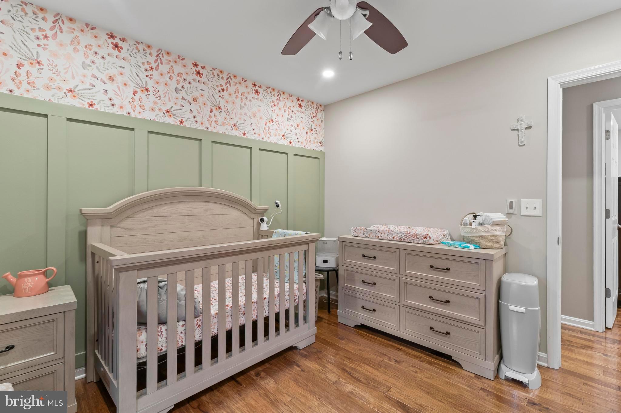 44350 Clarkes Landing Road Hollywood, MD 20636 - Photo 10 of 39 a bedroom with furniture and baby crib