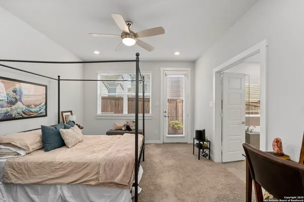 a bed room with a bed and furniture