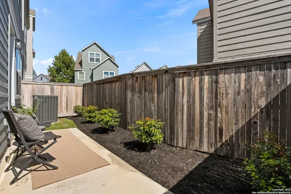 a garden view with a seating space