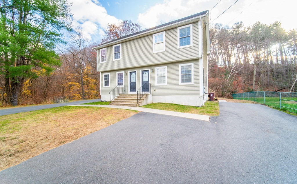 592 Russell Road Westfield, MA 01085 - Photo 1 of 32 a view of a house with swimming pool and a yard