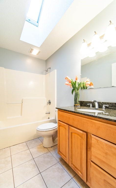 592 Russell Road Westfield, MA 01085 - Photo 14 of 32 a bathroom with a sink a toilet and shower