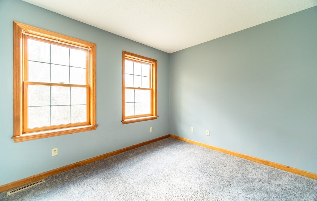 592 Russell Road Westfield, MA 01085 - Photo 20 of 32 an empty room with a window