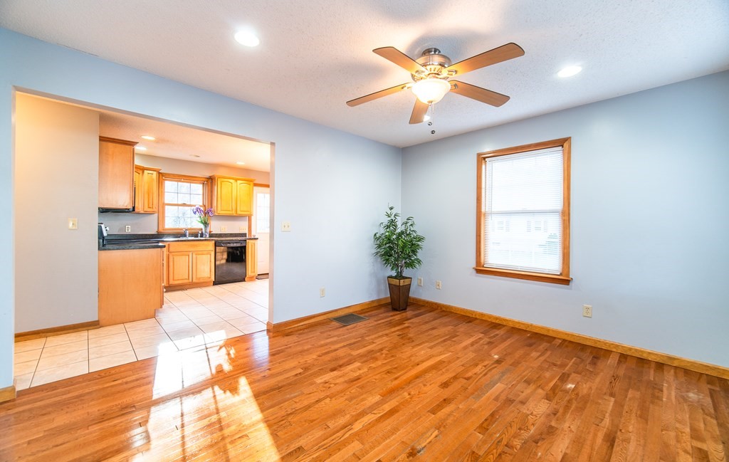 592 Russell Road Westfield, MA 01085 - Photo 10 of 32 wooden floor in an empty room with a window