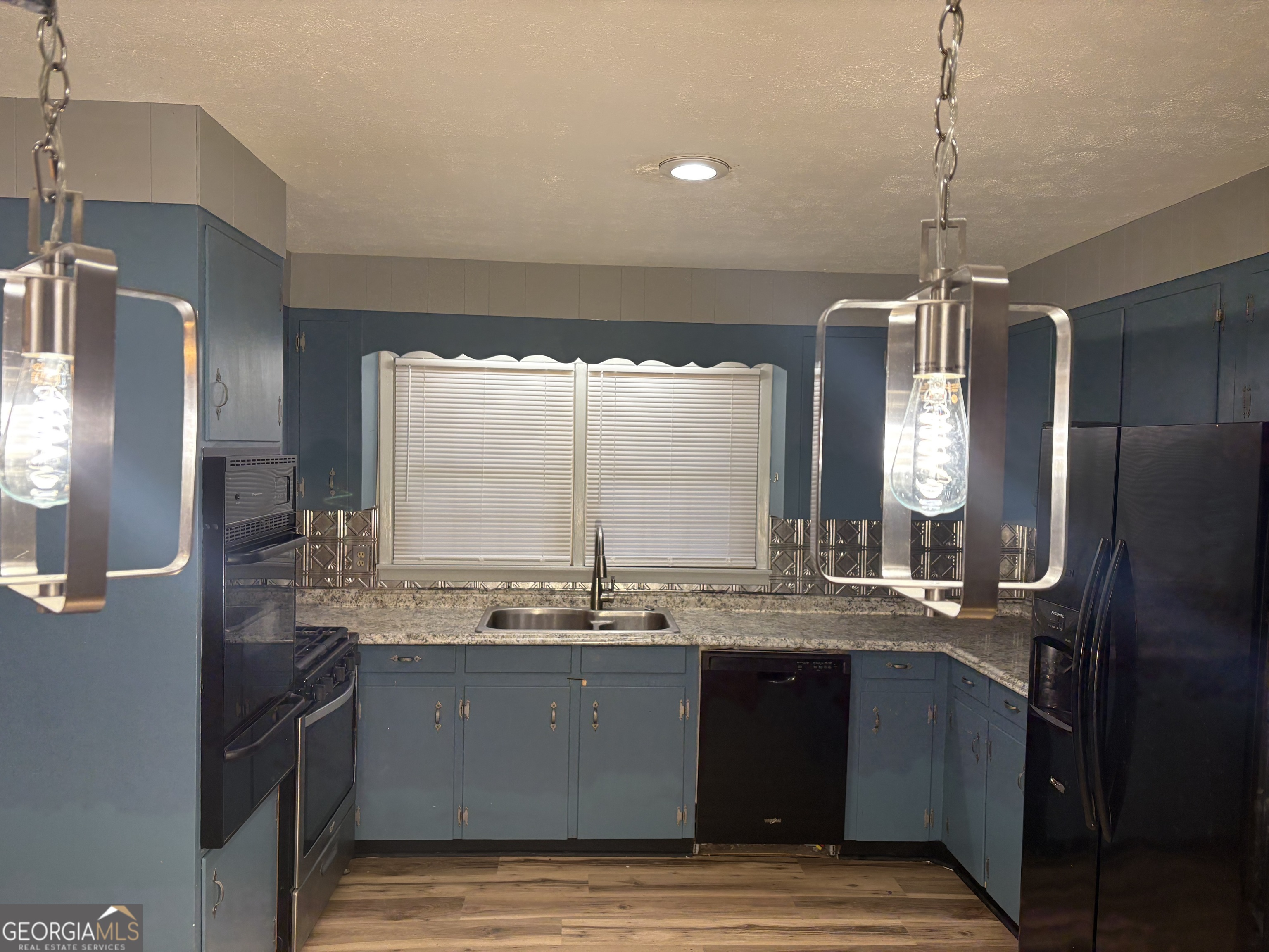 111 Hawthorne Road Warner Robins, GA 31093 - Photo 11 of 22 a bathroom with a sink double vanity and a mirror