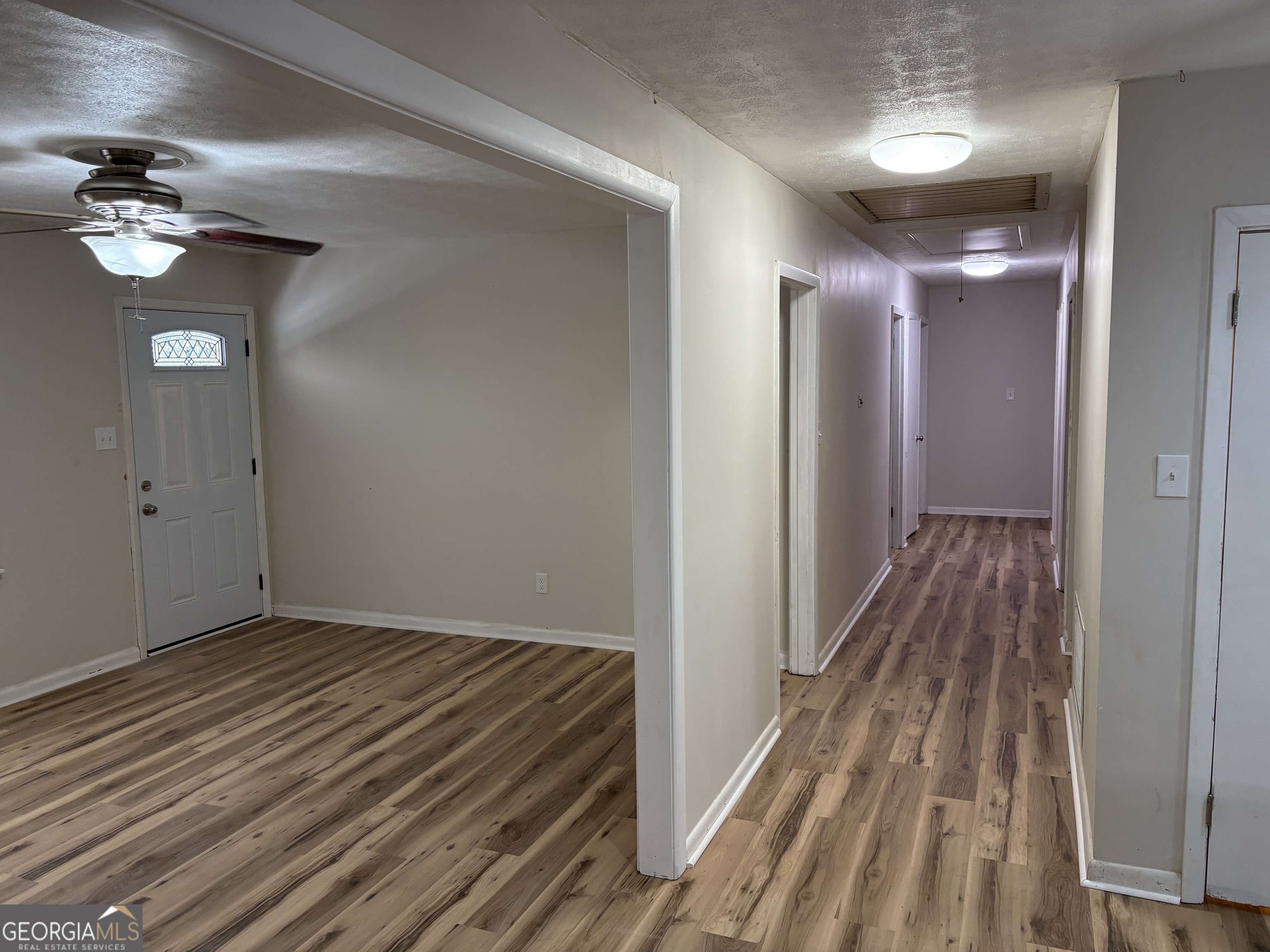 111 Hawthorne Road Warner Robins, GA 31093 - Photo 15 of 22 a view of a hallway with wooden floor