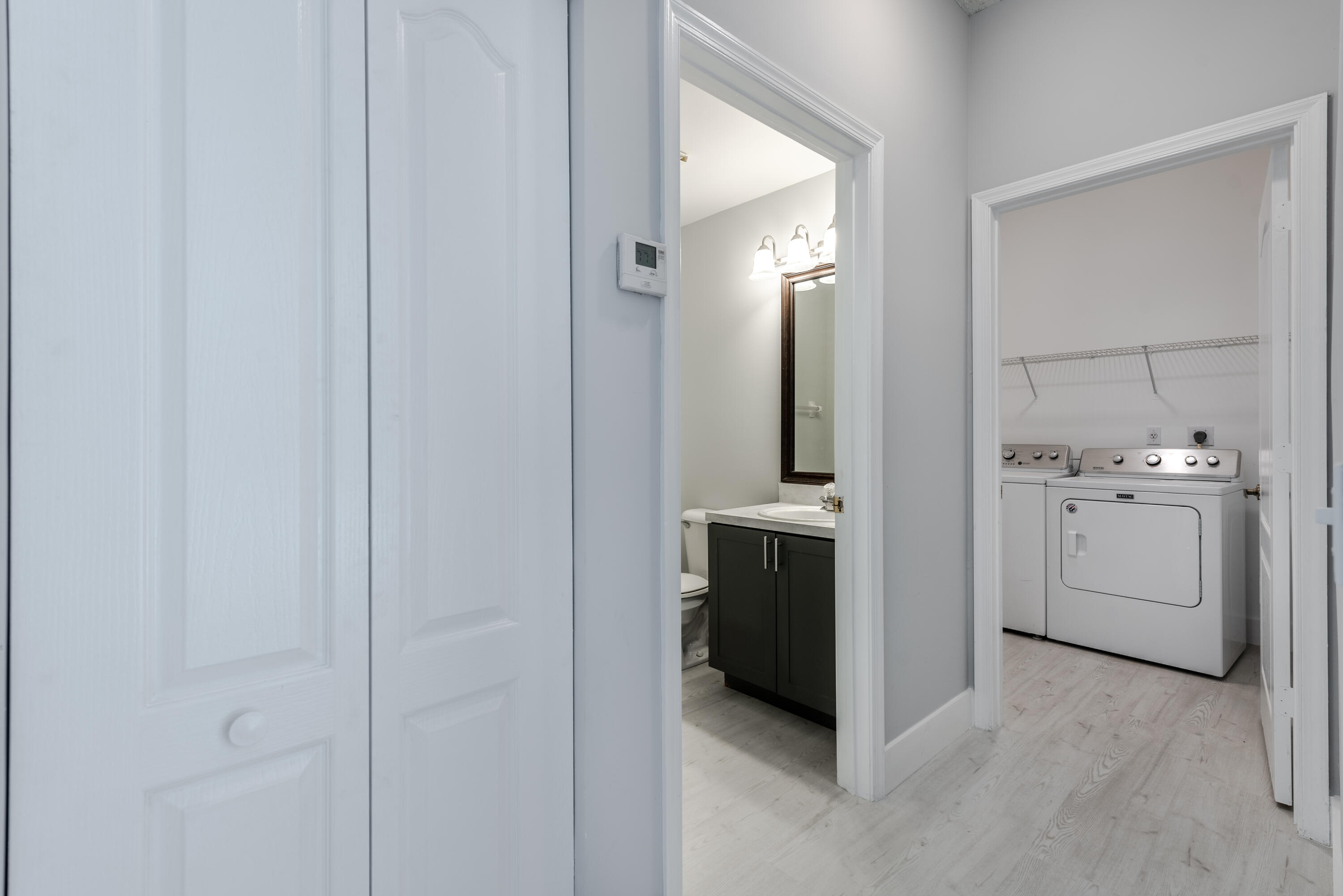 9542 Fox Trot Lane Boca Raton, FL 33496 - Photo 16 of 49 half bath/laundry rm